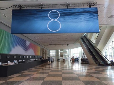 A banner for iOS 8 shows the number 8 against a watery background