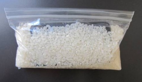 Submerge and seal your iPhone in a bag of rice to extract water from the handset. 