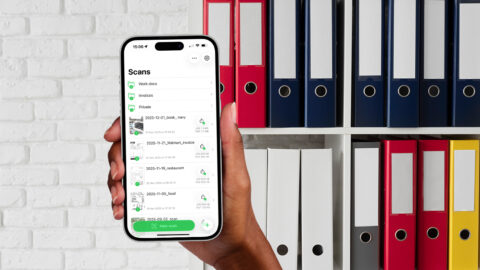 Hand holding iPhone with scanning app