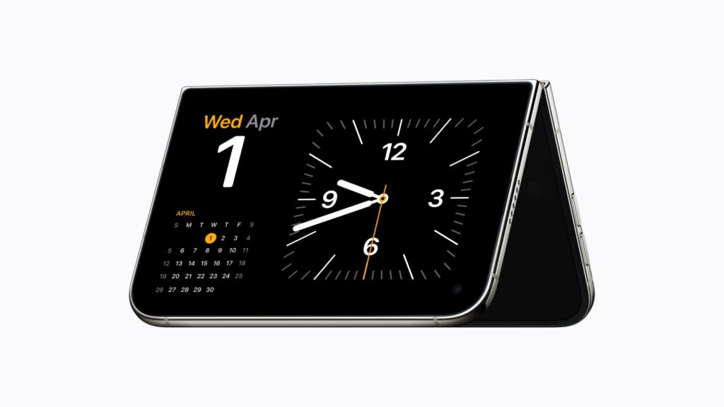 iPhone Duo folded into a tent showing a StandBy clock and calendar